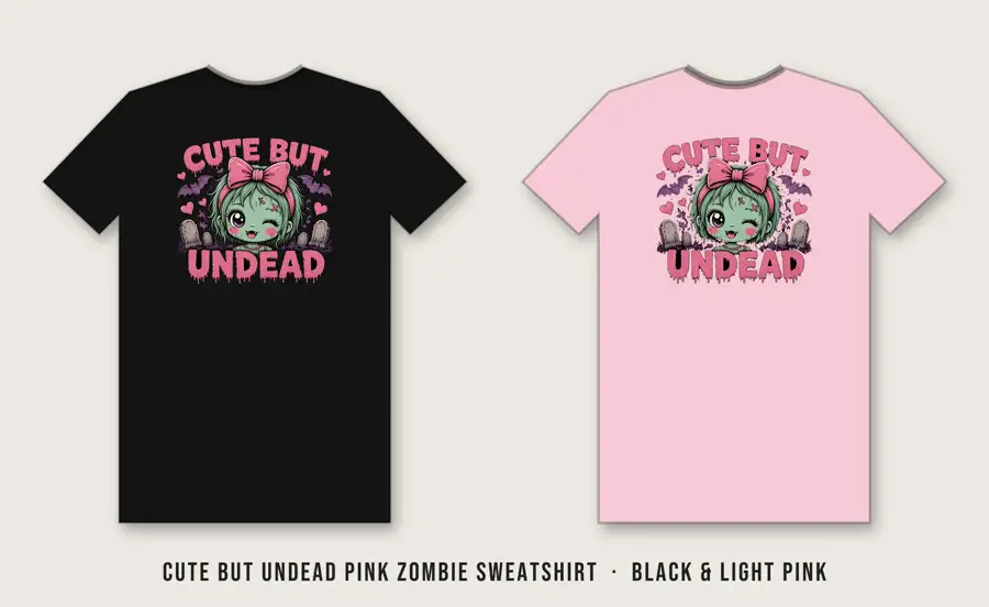 Cute But Undead Pink Zombie Sweatshirt: Kawaii mint-green zombie head with a pink bow, one sparkly eye, one stitched X eye, blush, tiny fang and forehead stitches, plus hearts and a lavender bat