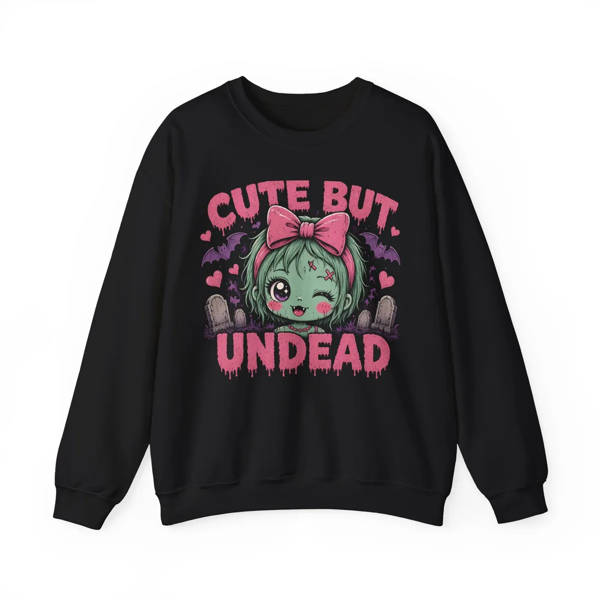 Cute But Undead Pink Zombie Sweatshirt: Kawaii mint-green zombie head with a pink bow, one sparkly eye, one stitched X eye, blush, tiny fang and forehead stitches, plus hearts and a lavender bat