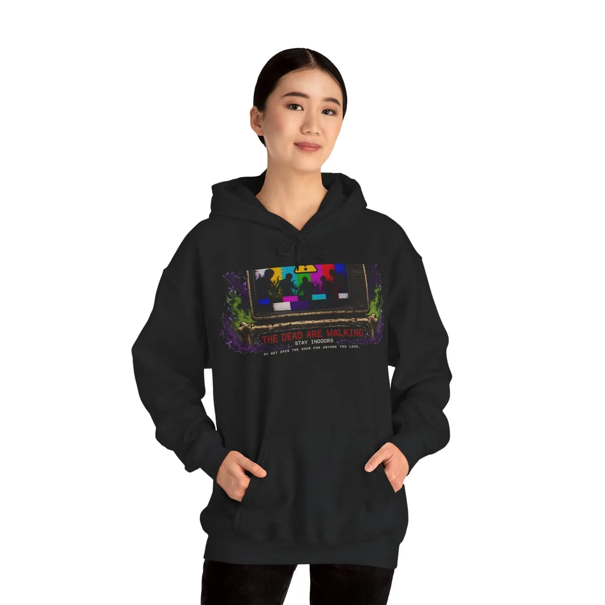 Emergency Broadcast: The Dead Are Walking Hoodie in Black: worn by a model