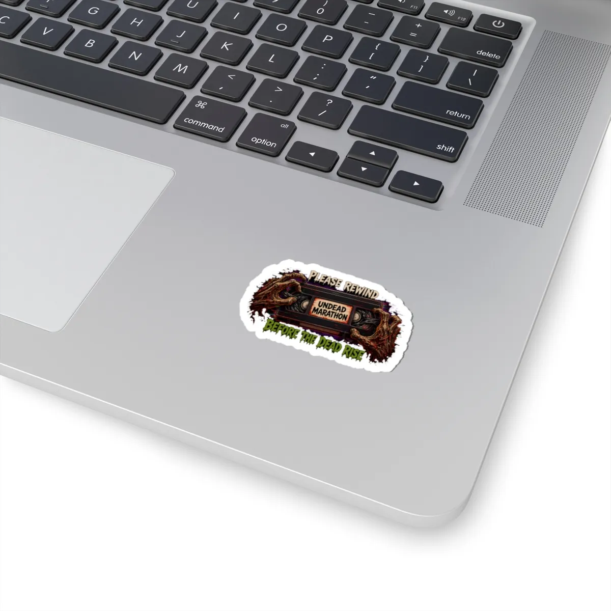 Please Rewind VHS Horror Vinyl Sticker: on a laptop